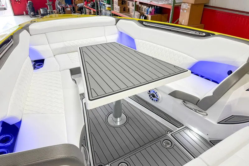 Slide: The Image of Luxurious interior of 2021 Nor-Tech 450 Sport boat with elegant seating and table. - 17