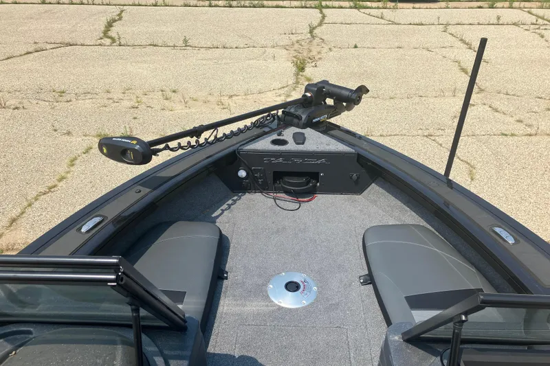 Slide: The Image of 2025 Tracker Targa V-19 Combo boat interior with seating and trolling motor. - 5