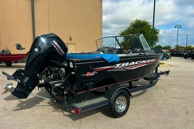 Slide: The Image of 2020 Tracker Pro Guide V-165 WT boat with Mercury outboard motor on trailer. - 4