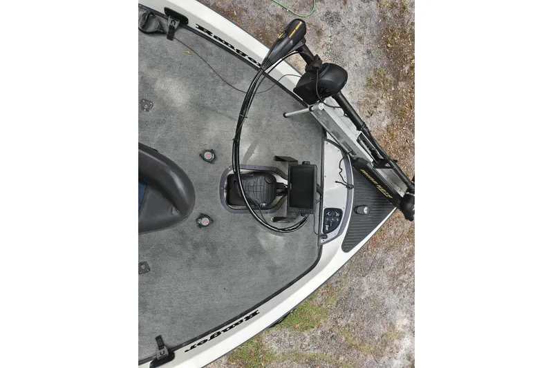 Slide: The Image of 2008 Ranger Z520 Comanche boat deck with trolling motor and control panel. - 12
