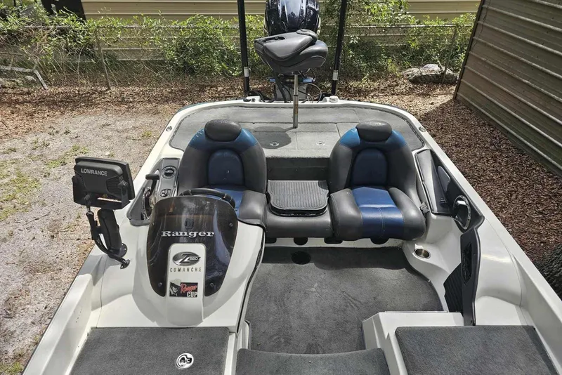 Slide: The Image of 2008 Ranger Z520 Comanche boat interior with seating and Lowrance equipment. - 3