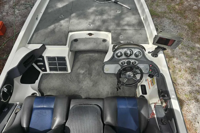 Slide: The Image of 2008 Ranger Z520 Comanche boat interior with steering wheel and control panel. - 5