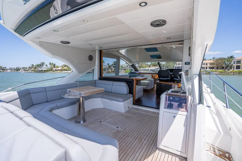 Slide: The Image of Luxurious 2018 Sunseeker Predator 57 yacht interior with spacious seating and elegant design. - 39