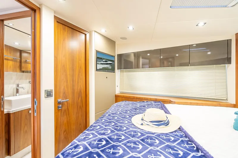 Slide: The Image of Luxurious interior of 2018 Sunseeker Predator 57 yacht with elegant wood finishes. - 80