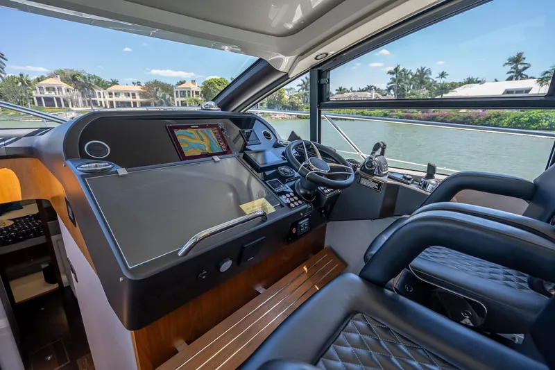 Slide: The Image of Interior cockpit of 2018 Sunseeker Predator 57 yacht with navigation system. - 60