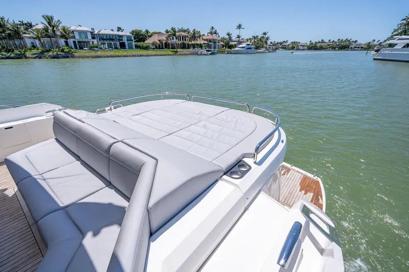 Slide: The Image of Luxurious 2018 Sunseeker Predator 57 yacht with spacious sunbathing deck on tranquil waters. - 28