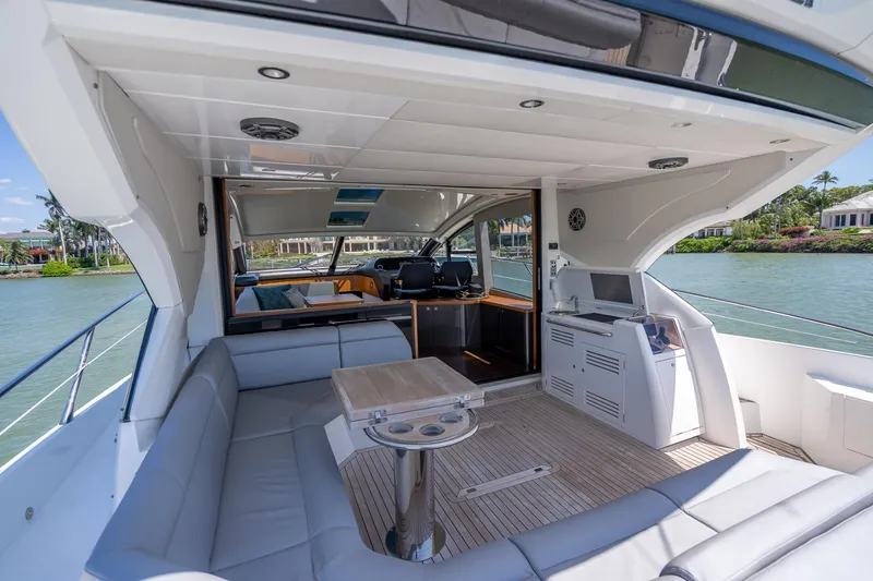 Slide: The Image of Luxurious 2018 Sunseeker Predator 57 yacht interior with spacious seating and modern amenities. - 42