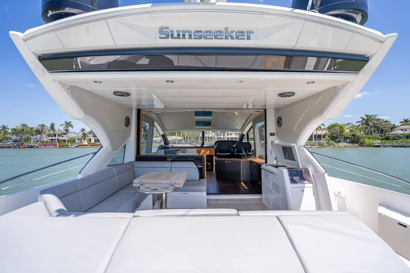 Slide: The Image of Luxurious 2018 Sunseeker Predator 57 yacht interior with spacious seating and scenic water view. - 41