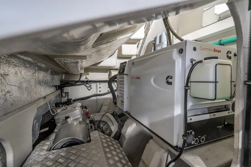 Slide: The Image of Engine room of 2018 Sunseeker Predator 57 yacht featuring Cummins Onan generator. - 93