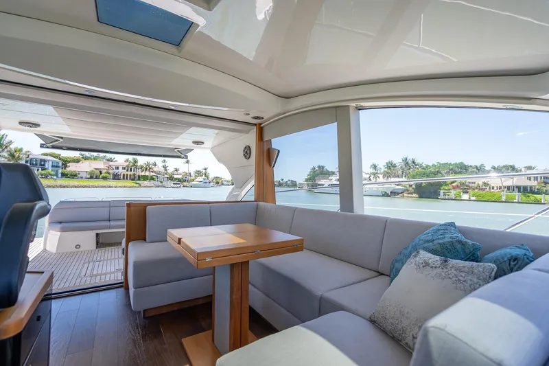 Slide: The Image of Luxurious interior of 2018 Sunseeker Predator 57 yacht with scenic waterfront view. - 47
