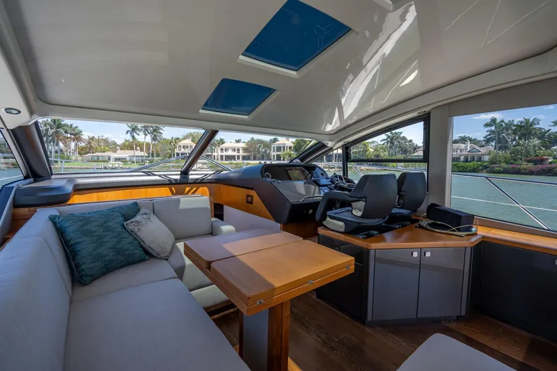 Slide: The Image of Luxurious interior of 2018 Sunseeker Predator 57 yacht with modern seating and helm. - 57