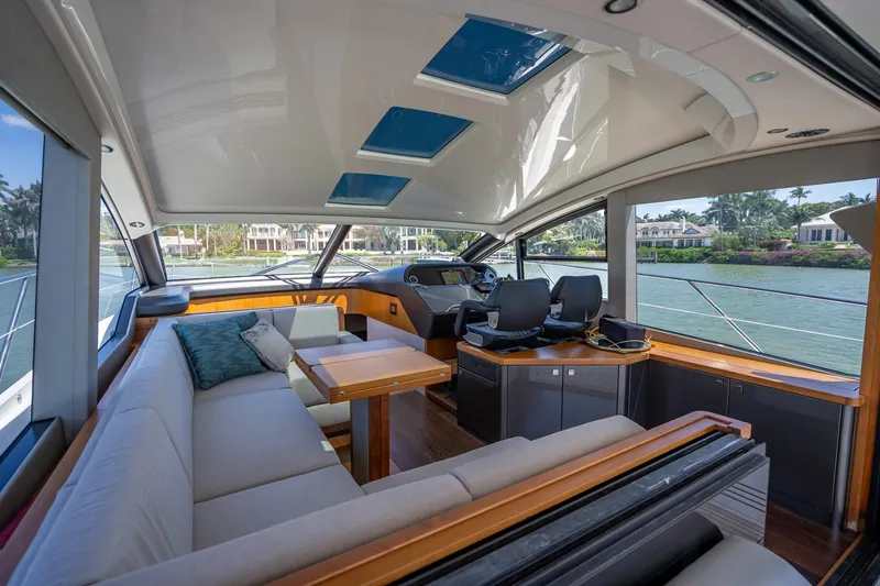 Slide: The Image of Luxurious interior of 2018 Sunseeker Predator 57 yacht with spacious seating and modern helm. - 51