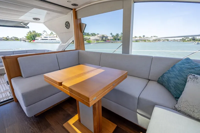 Slide: The Image of Luxurious interior of 2018 Sunseeker Predator 57 yacht with elegant seating and table. - 46