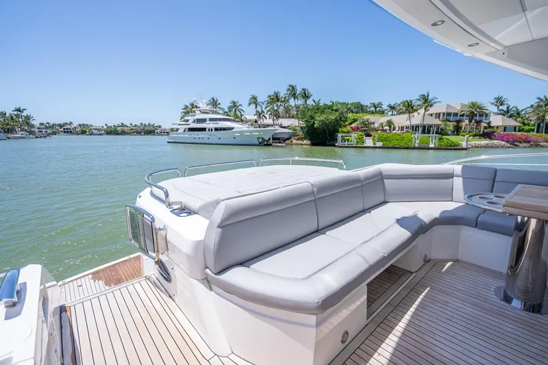 Slide: The Image of Luxurious 2018 Sunseeker Predator 57 yacht with spacious deck and waterfront view. - 37