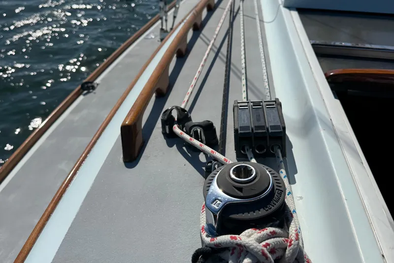 Slide: The Image of Deck view of 2000 Alerion Express 28 sailboat with winch and ropes. - 8