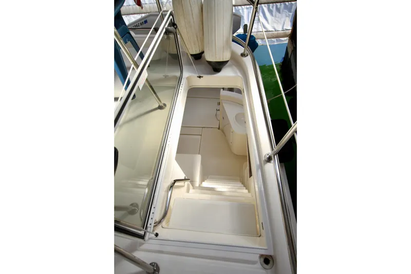 Slide: The Image of 2011 Fathom Element 43 boat interior with stairs and seating area. - 19