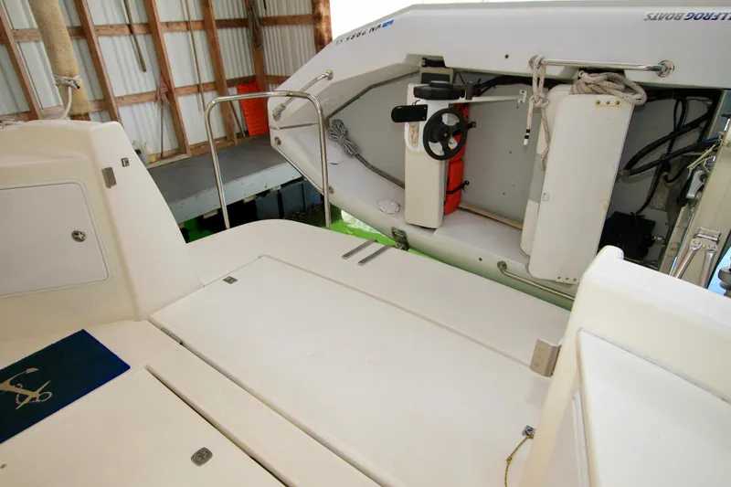 Slide: The Image of Interior view of a 2011 Fathom Element 43 boat in a docked position. - 20