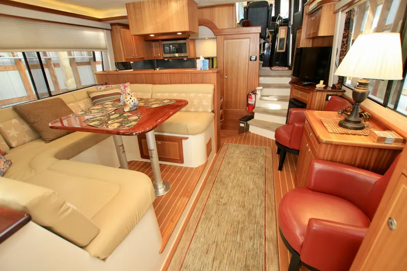 Slide: The Image of Luxurious interior of 2011 Fathom Element 43 yacht with elegant seating and wooden finishes. - 23