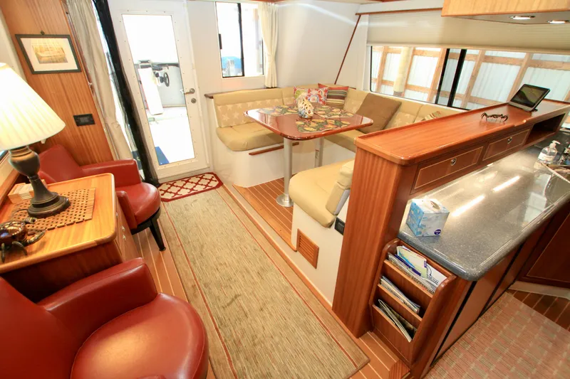 Slide: The Image of Luxurious interior of 2011 Fathom Element 43 yacht with elegant seating and wooden finishes. - 28