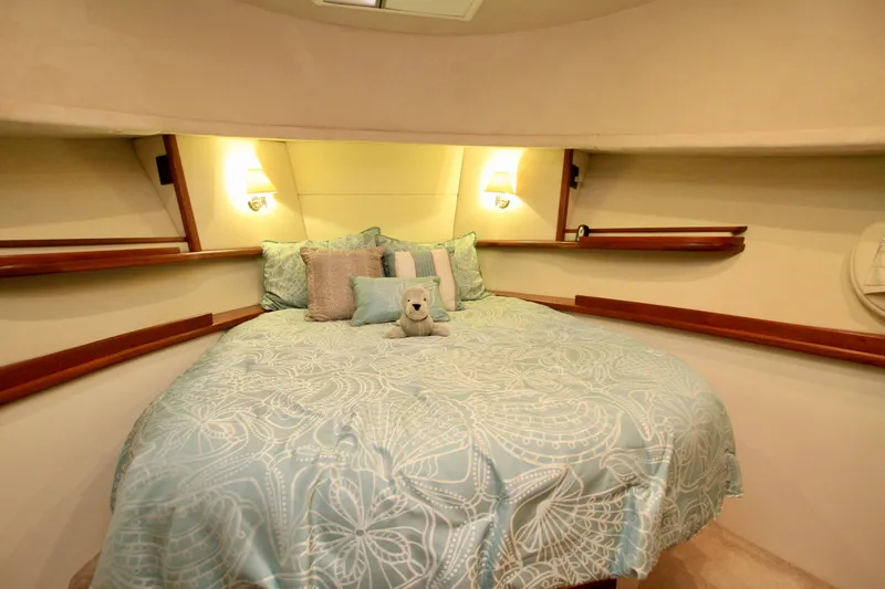 Slide: The Image of Cozy bedroom in 2011 Fathom Element 43 yacht with plush bedding and soft lighting. - 54