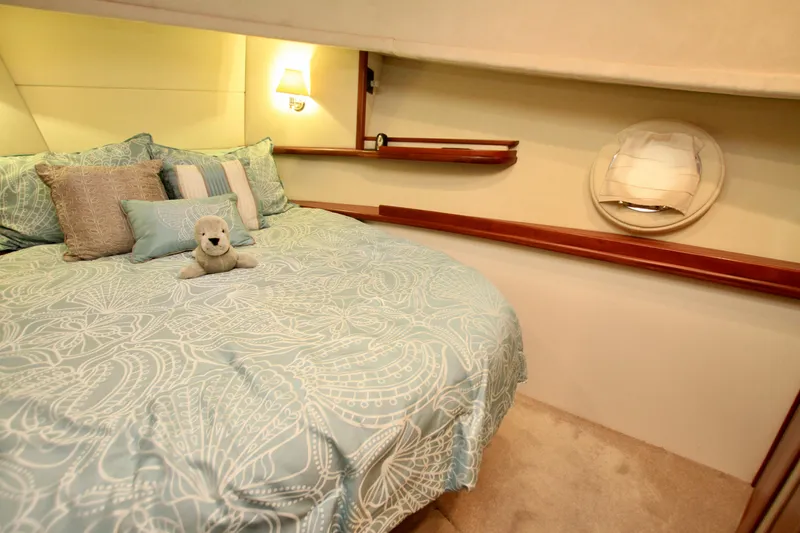 Slide: The Image of Cozy bedroom in 2011 Fathom Element 43 yacht with plush bedding and soft lighting. - 55