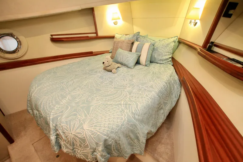 Slide: The Image of Luxurious cabin interior of 2011 Fathom Element 43 yacht with cozy bed and plush decor. - 56