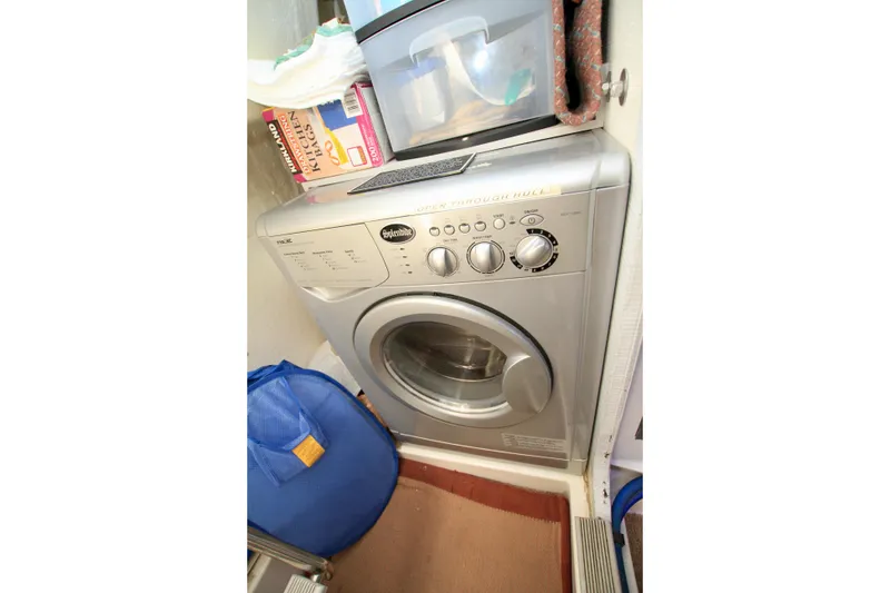 Slide: The Image of Silver washing machine in a compact laundry space, Fathom Element 43, 2011 model. - 70
