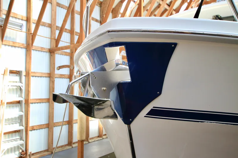 Slide: The Image of Bow of 2011 Fathom Element 43 boat in wooden boathouse. - 72