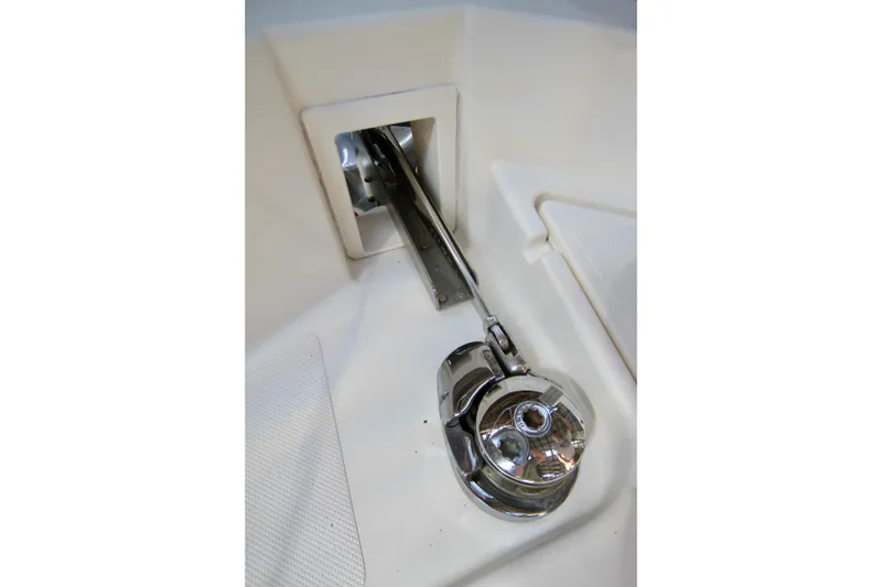 Slide: The Image of Anchor windlass on 2011 Fathom Element 43 boat, featuring polished metal components. - 75