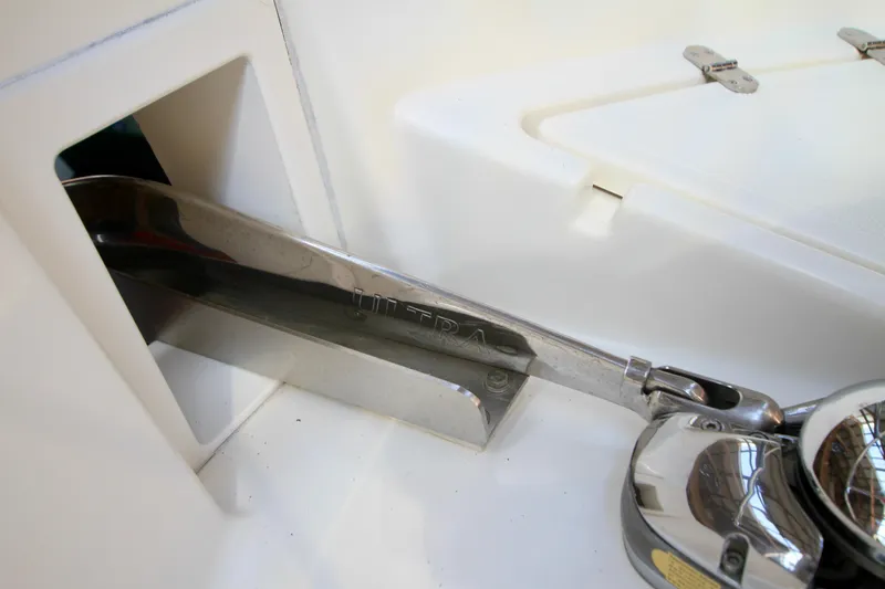 Slide: The Image of Anchor system on 2011 Fathom Element 43 boat, featuring a polished metal design. - 76