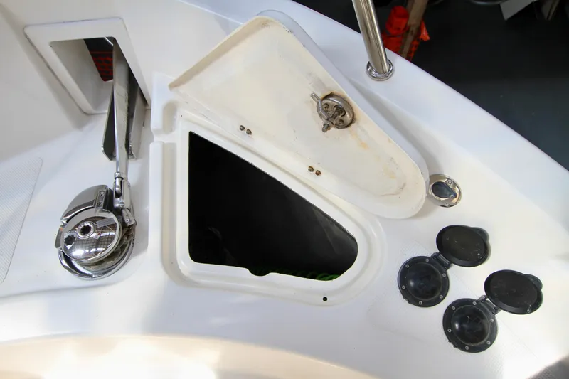 Slide: The Image of Open hatch and controls on 2011 Fathom Element 43 boat deck. - 78