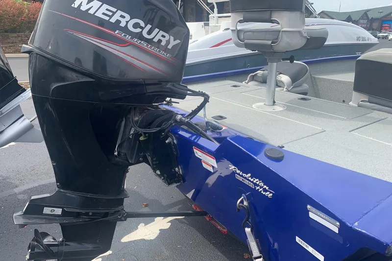Slide: The Image of 2017 Tracker Pro Team 175 TF boat with Mercury FourStroke engine, blue hull. - 2