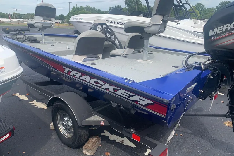 Slide: The Image of 2017 Tracker Pro Team 175 TF boat on trailer, featuring Mercury outboard motor. - 3