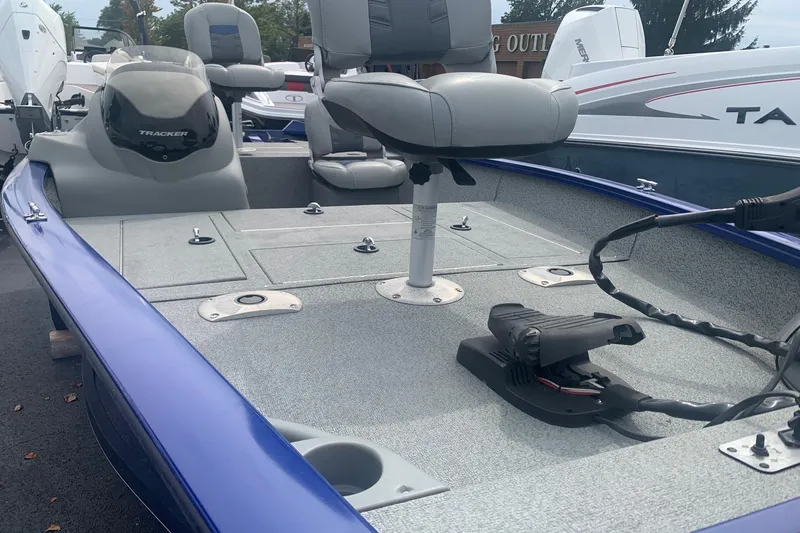 Slide: The Image of 2017 Tracker Pro Team 175 TF fishing boat interior with seating and equipment. - 4