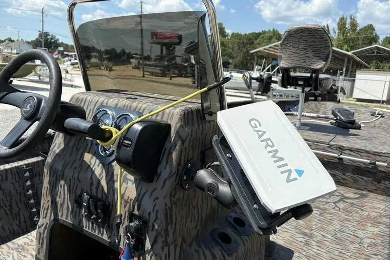 Slide: The Image of 2024 Xpress XP200 Catfish boat dashboard with Garmin navigation system. - 11