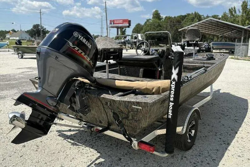 Slide: The Image of 2024 Xpress XP200 Catfish boat with Yamaha outboard motor on trailer. - 6