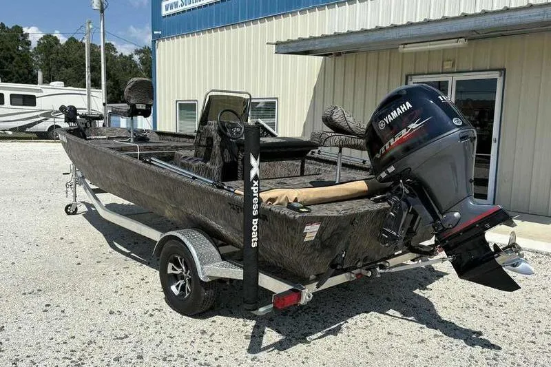 Slide: The Image of 2024 Xpress XP200 Catfish boat with Yamaha outboard motor on trailer. - 9