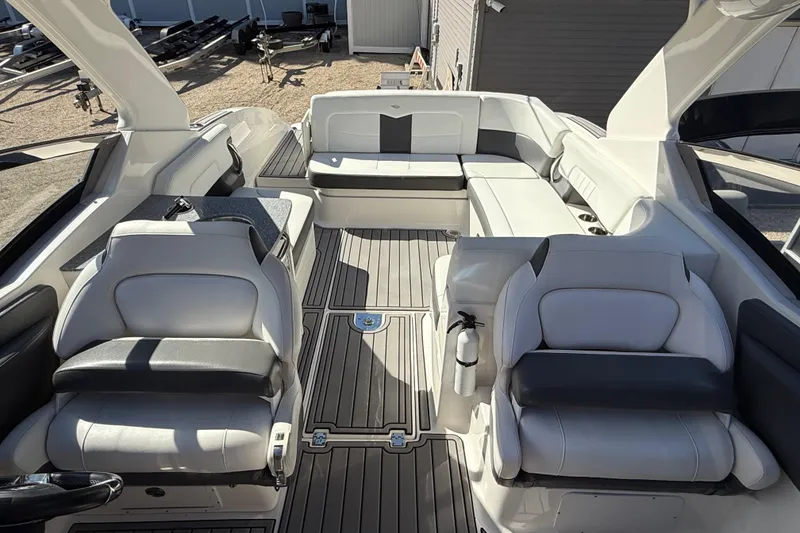 Slide: The Image of 2016 Chaparral 307 SSX boat interior with luxurious seating and modern design. - 23