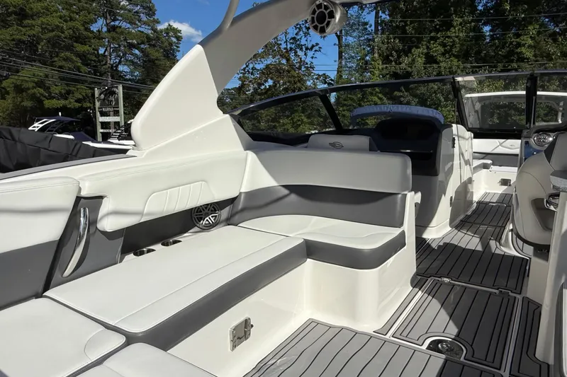 Slide: The Image of 2016 Chaparral 307 SSX boat interior with sleek seating and modern design. - 44