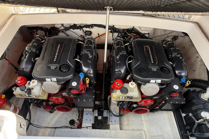 Slide: The Image of Twin Volvo Penta engines in a 2016 Chaparral 307 SSX boat engine compartment. - 50