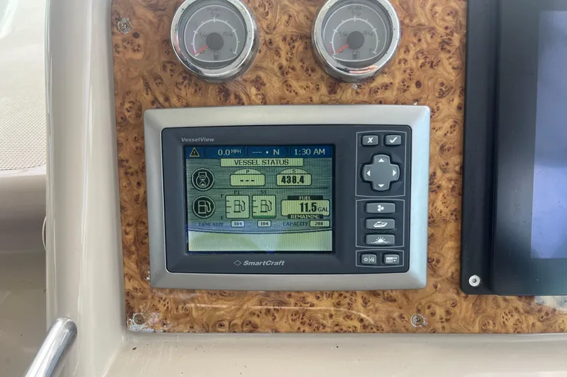 Slide: The Image of 2012 Formula 34 Performance Cruiser dashboard with SmartCraft VesselView display. - 19