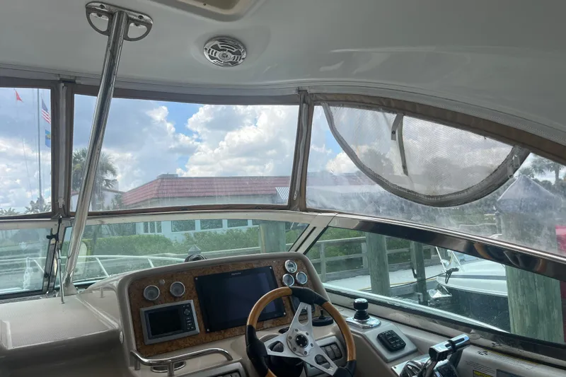 Slide: The Image of Interior view of 2012 Formula 34 Performance Cruiser helm with navigation equipment. - 27