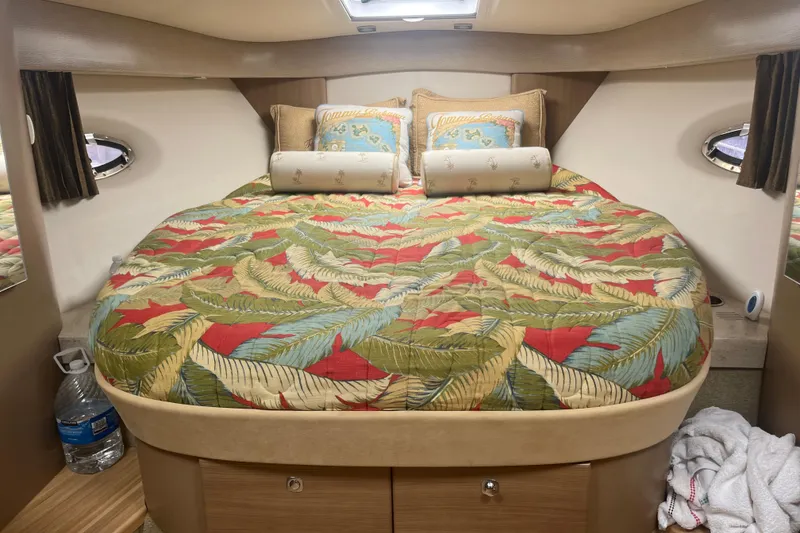 Slide: The Image of Cozy cabin interior of 2012 Formula 34 Performance Cruiser with tropical bedding. - 30