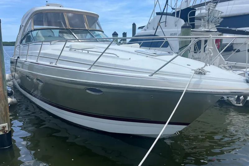 Slide: The Image of 2012 Formula 34 Performance Cruiser docked at marina, side view. - 4