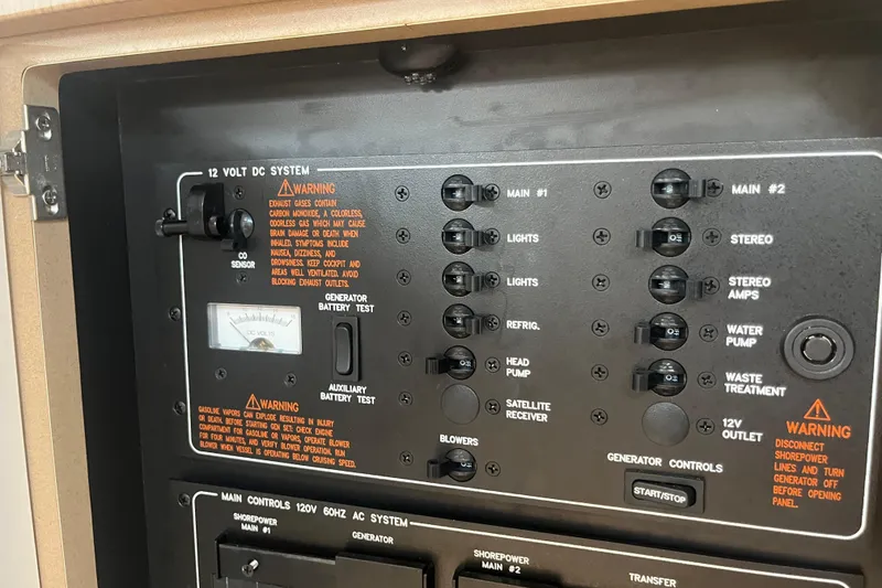 Slide: The Image of Control panel of a 2012 Formula 34 Performance Cruiser, featuring 12V DC system switches. - 45