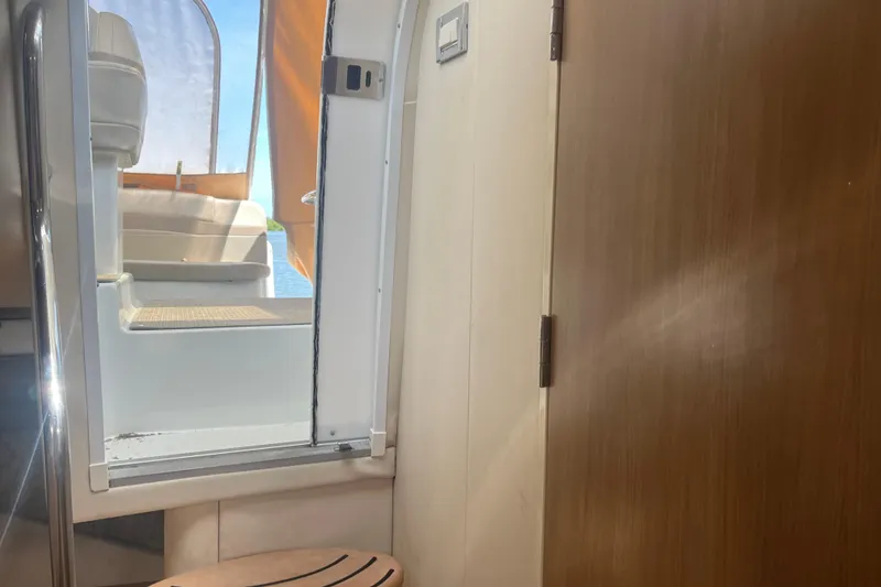 Slide: The Image of Interior view of 2012 Formula 34 Performance Cruiser, showing cabin entrance and seating. - 49