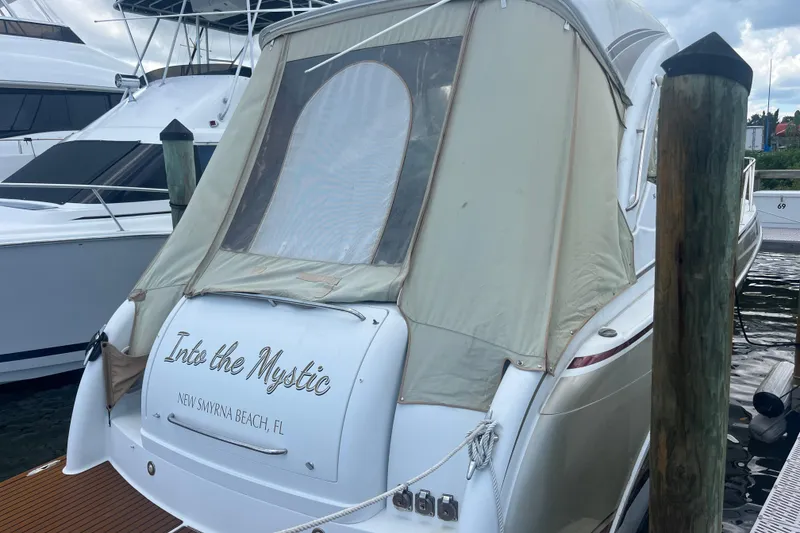 Slide: The Image of 2012 Formula 34 Performance Cruiser docked, named "Into the Mystic," New Smyrna Beach, FL. - 5