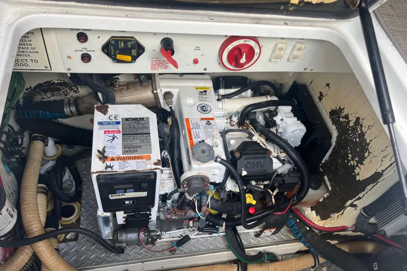 Slide: The Image of Engine compartment of a 2012 Formula 34 Performance Cruiser with Kohler generator. - 53