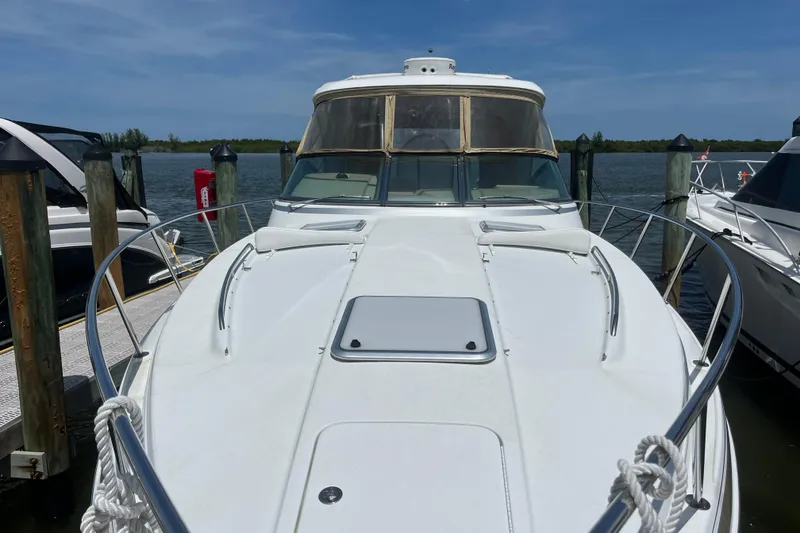 Slide: The Image of 2012 Formula 34 Performance Cruiser docked at marina, front view. - 54