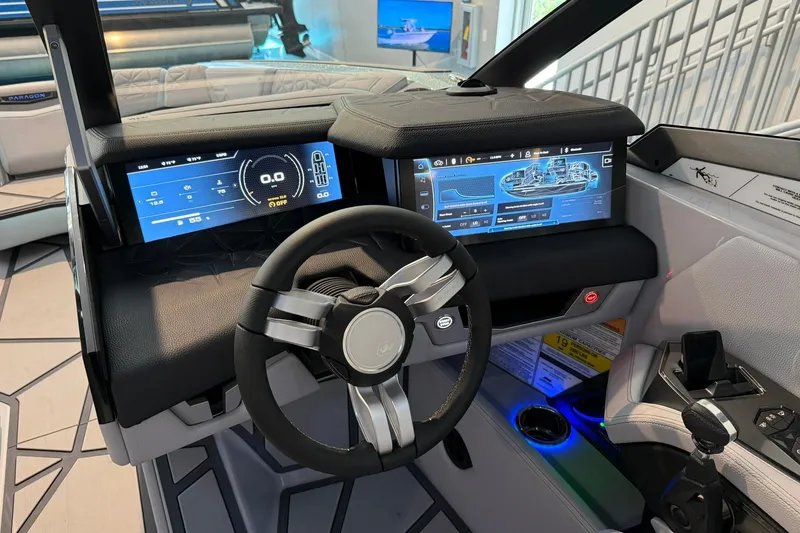 Slide: The Image of Interior dashboard of 2026 Nautique Super Air Nautique G25 Paragon with advanced digital displays. - 16